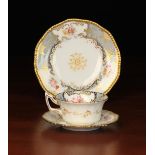 A 19th Century Coalport Grey "Batwing" Patterned Trio comprising of teacup,