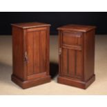 Two Edwardian Mahogany Bedside Cabinets with groove moulded doors and plinth bases.