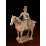 A Fine Tang Dynasty Painted Pottery Horse & Rider (618-906 AD).