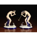 Two An Art Deco Style Royal Dux Figures of Semi-Naked Female Snake Charmers wearing gilt trimmed