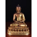 A Fine Antique Chinese Tibetan Gilt Bronze Buddha, 18th/Early 19th Century, 19¼" (49 cm) high.