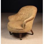 A Late Victorian Upholstered Tub Chair covered in a mustard coloured sculpted velvet fabric and