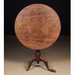 A Georgian Mahogany Tilt-topped Tripod Table (A/F).