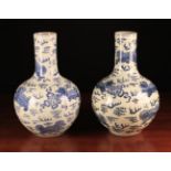 Two Similar Large Chinese Blue & White Tiaqiuping Bottle Vases.