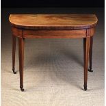 A George III Inlaid Mahogany Games Table.