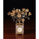 A Small Ornamental Cut Glass & Gilt Metal Clock with alarm.