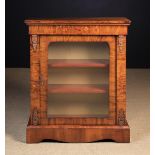 A Victorian Inlaid Figured Walnut Side Cabinet with Glazed Door.