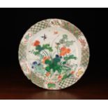 A Famille Verte Kangxi Dish decorated with ducks and flowering lotus, 14½" (37 cm) in diameter,