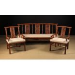 A 20th Century Chinese Three Piece Suite comprising of a Settee & Two Armchairs carved from