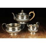 A George III Silver Teaset hallmarked London 1815-16 with maker's punch for Michael Starkey.