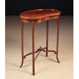 An Edwardian Kidney-shaped Occasional Table.