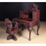 An Elaborately Carved Japanese Lacquered Desk & Chair (Reputedly winner of a 1910 competition in