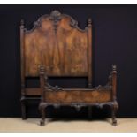 A Early 20th Century Figured Walnut Single Bedstead in the Queen Anne Style.