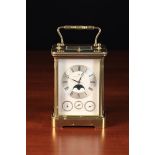 A Matthew Norman Gilt Brass Carriage Clock.