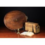 A 19th Century Mahogany Oval Gallery Tray with brass scroll handles and an inlaid compass star to