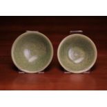 Two Similar Yaozhou Kiln Type Bowls decorated with undulant sprays of flowers & foliage.