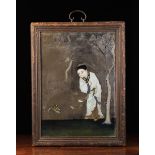 An Antique Chinese Reverse Painted Mirror depicting Lui Hai;