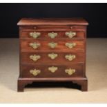 A Small and Attractive 18th Century Mahogany Veneered Chest of Drawers with brushing slide.