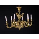 A Six Branch Gilt Bronze Chandelier.