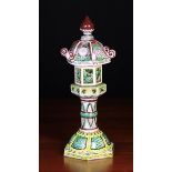 A Hexagonal Chinese Temple Candle-stand with enamelled decoration, 13½" (34 cm) in height.