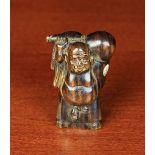 A Small Japanese Hardwood Carving of Hotei carrying a double gourd upon with shoulders,