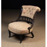 A Low Victorian Upholstered Salon Chair.