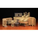 A Collection of Vintage Doll's House Furniture contained in a wicker case.