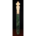A 19th Century Page Turner with spinach green jade blade and a reeded ivory handle carved with
