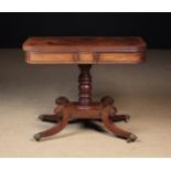 A Regency Mahogany Fold-over Tea Table.