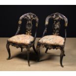 A Pair of Victorian Black Lacquered Papier mâché Chairs elaborately decorated with butterflies and