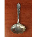 A Tiffany Silver Sifting Spoon.