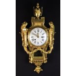 A Fine Louis XVI Style Gilt Bronze Cartel Clock.