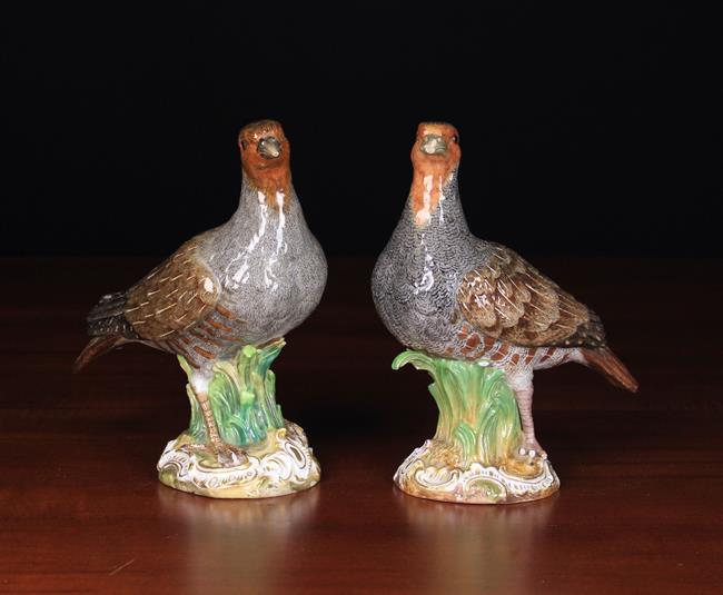 A Pair of 19th Century Meissen Partridges (A/F) stood amongst clumps of reed;