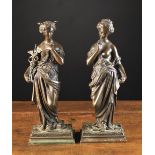 A Pair of 19th Century Bronze Figures: Classical nymphs scantily dressed in draped robes: One