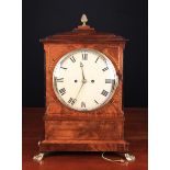 A Regency Mahogany & Brass Inlaid Bracket Clock with eight day twin-fusee movement striking a bell.