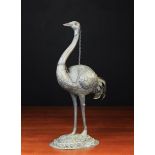 A Fabulous Late 19th Century Ostrich Egg Holder composed of embossed & chased sheet metal with