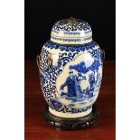 A Fine 18th Century Chinese Blue & White Vase & Cover with original swing handles.