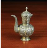 A Small Ottoman Silver Metal & Gilt Ewer having a body on a raised foot,