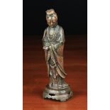 An 18th/19th Century Chinese Bronze Figure of a Standing Guanyin retaining traces of residual red