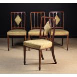 A Set of Four Sheraton Revival Mahogany Chairs inlaid with satinwood cross-banding enhanced by