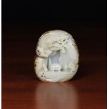 A Fine 18th Century Chinese Pale Celadon Jade Pebble Carving with dark inclusions to the perimeter,