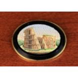 A Micro-Mosaic Brooch depicting The Colosseum.