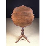 A 19th Century Hardwood Tilt-top Tripod Table with Bird-cage support.