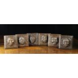 Six Small 17th Century Carved Oak Panels; each with a protuberant caricature face to the centre,