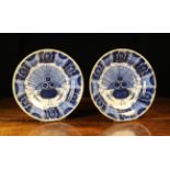 A Pair of 18th Century Dutch Delft Blue & White Plates decorated with peacock pattern and edged