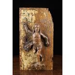 A 17th Century Tabernacle Door carved in relief with a depiction of Christ Risen,