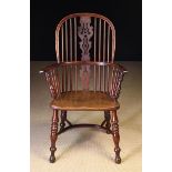 A 19th Century Yew-wood High Decorative Splat Windsor Armchair attributed to Worksop.