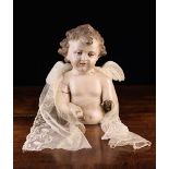 A 19th Century Composite Bust of a curly-hairy cherub with glass inset eyes (A/F),
