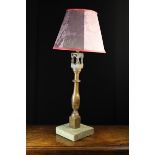 An Occasional Lamp with purple 'damask' shade on a turned oak baluster column incorporating a