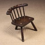 A 19th Century Low Comb-back Primitive Chair, possibly Irish.
